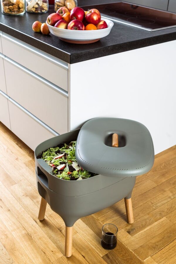 Light grey Urbalive worm composter with food scraps and liquid worm tea